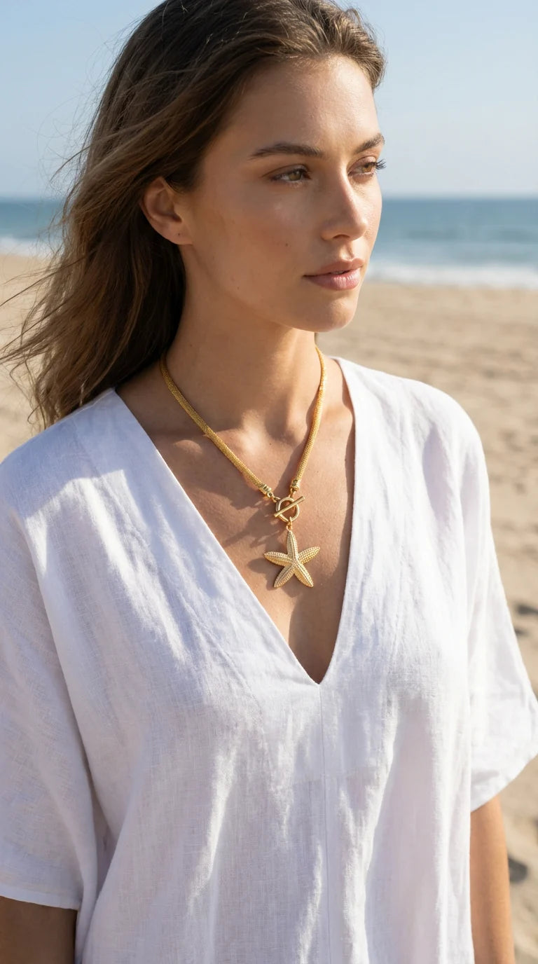 Short gold mesh chain with T-bar and starfish pendant