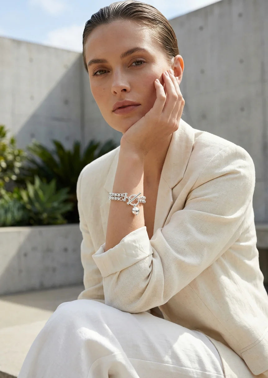 Double layered silver chain bracelet with T-bar and ball charm