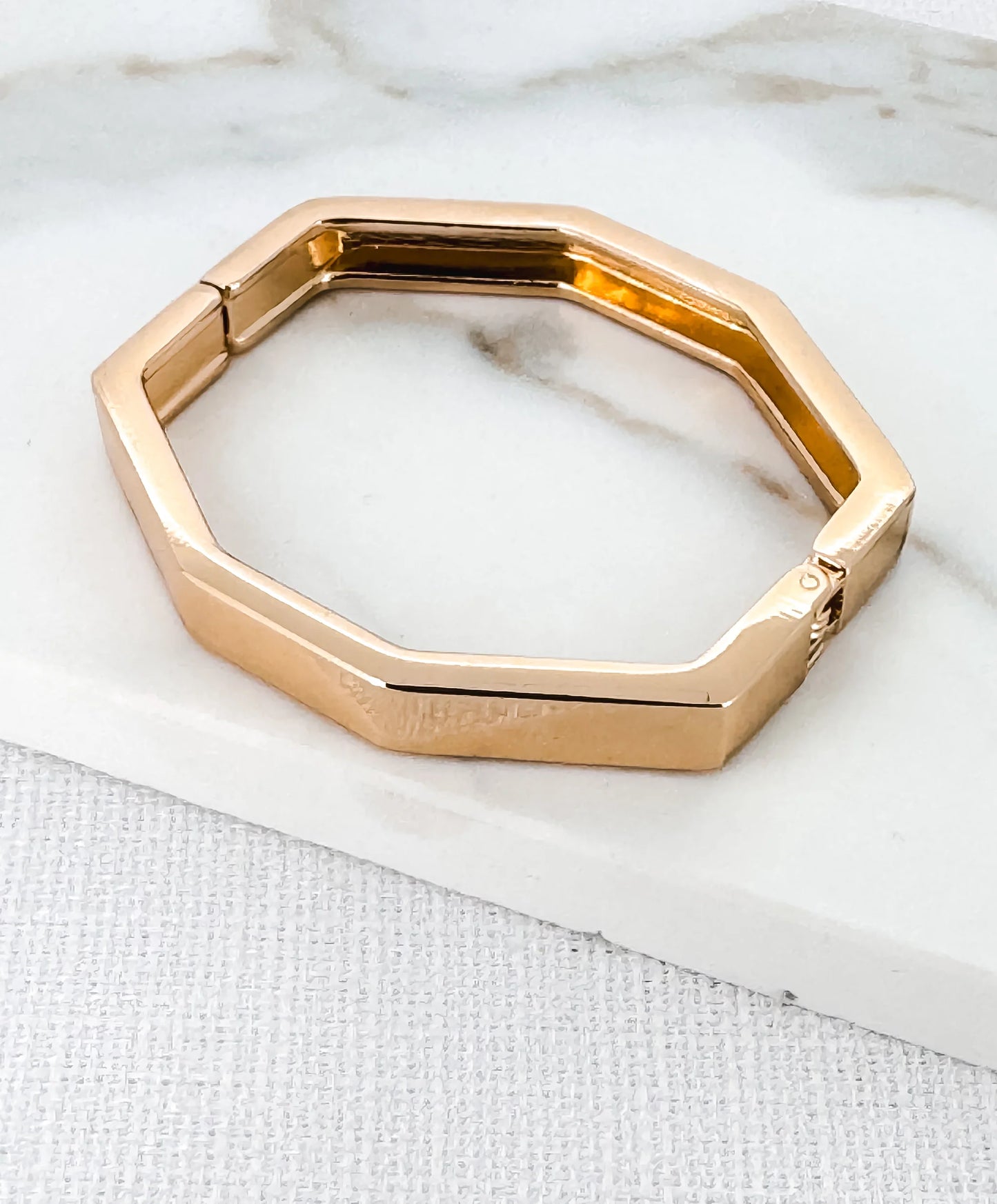 Gold hinged hexagonal bangle