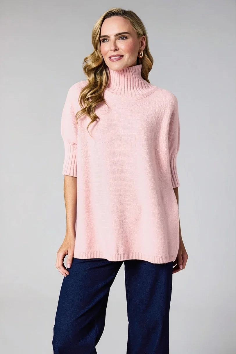 Timeless long knit with gently ribbed short sleeves and an unstructured silhouette. Effortlessly transitions from day to evening, offering the perfect balance of comfort and style for any occasion.

Fabric: 52% Viscose 26% Polyester 22% Polyamide