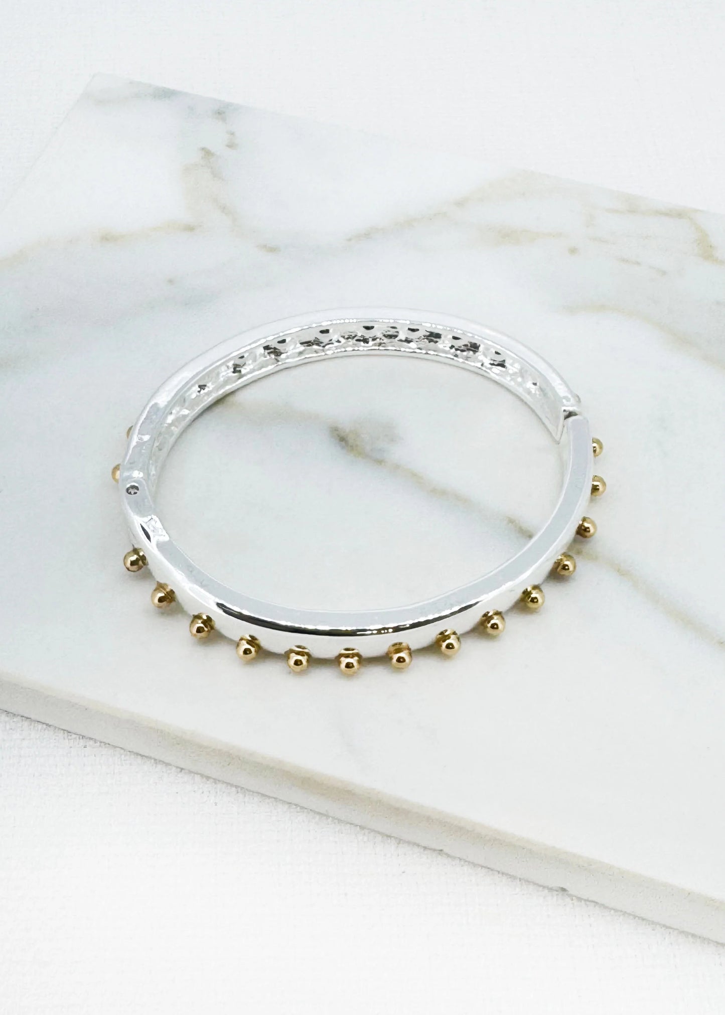 Silver and gold two tone stud hinged bangle