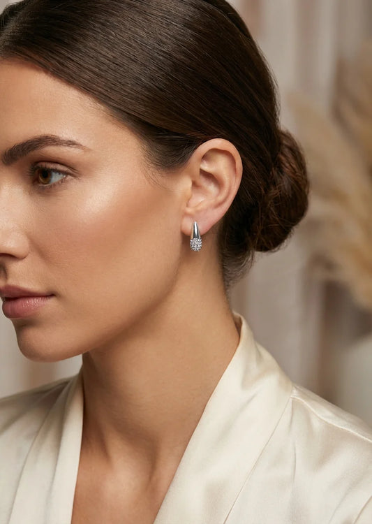 Silver and diamante teardrop earring