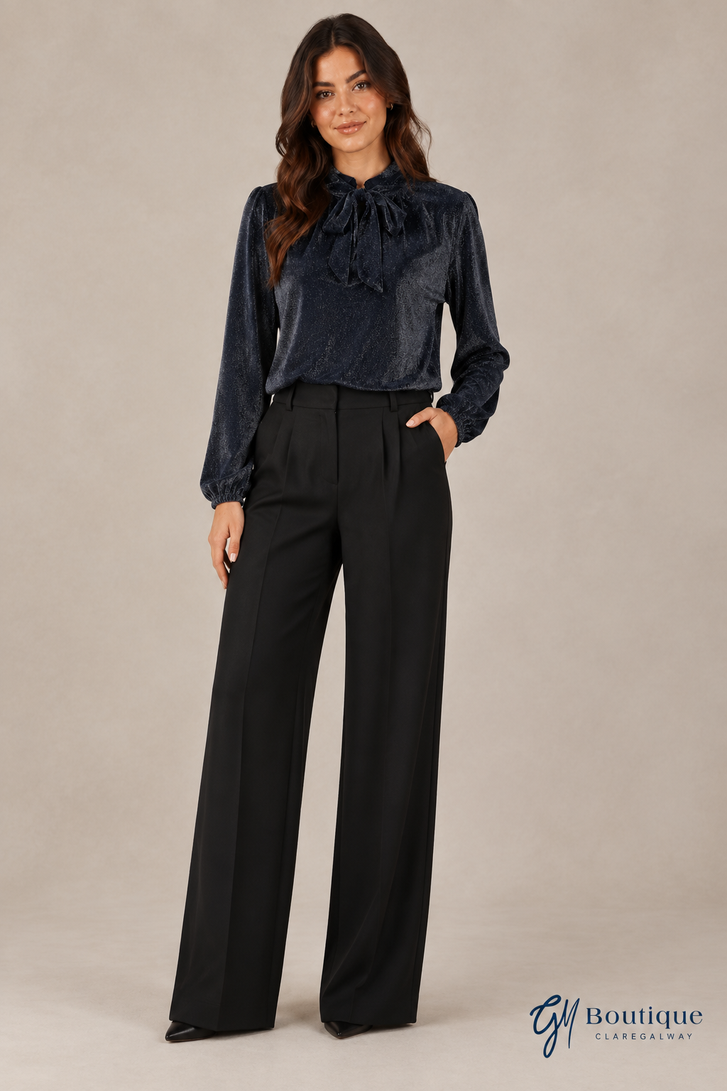 Evening styling preview with Mos Mosh black sateen pants, dark blue Oui tie-neck blouse and pointed black heels sold at GM Boutique