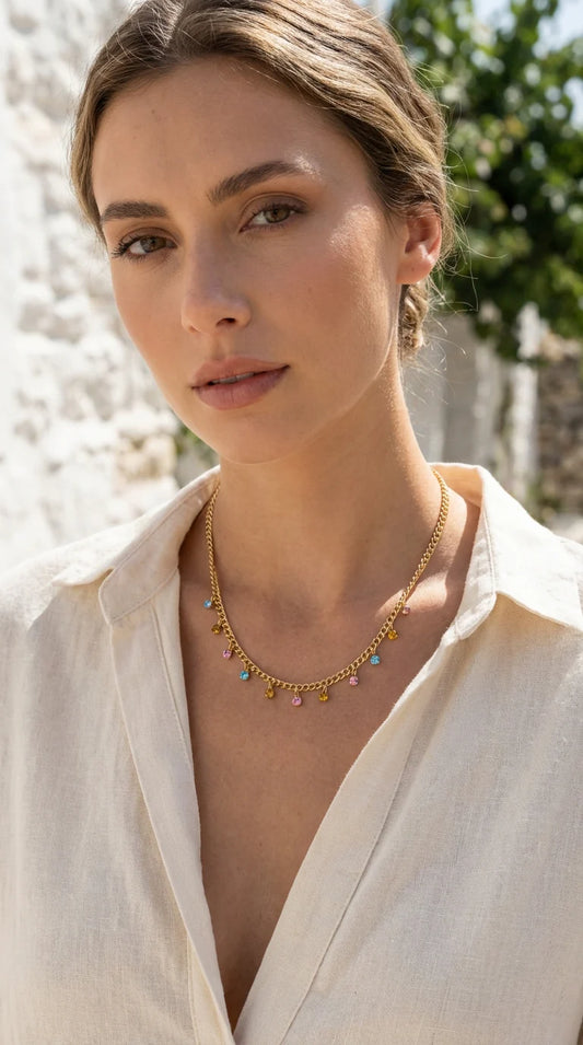 Short gold necklace with multicolour crystal droppers