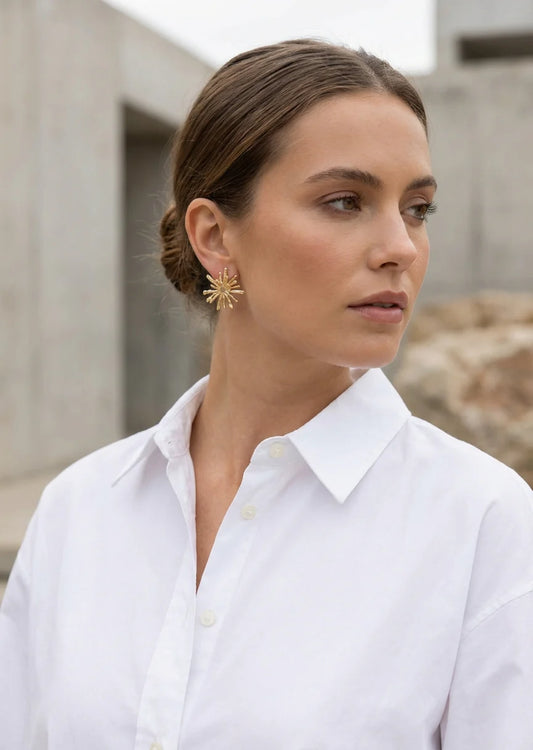 Gold starburst earring